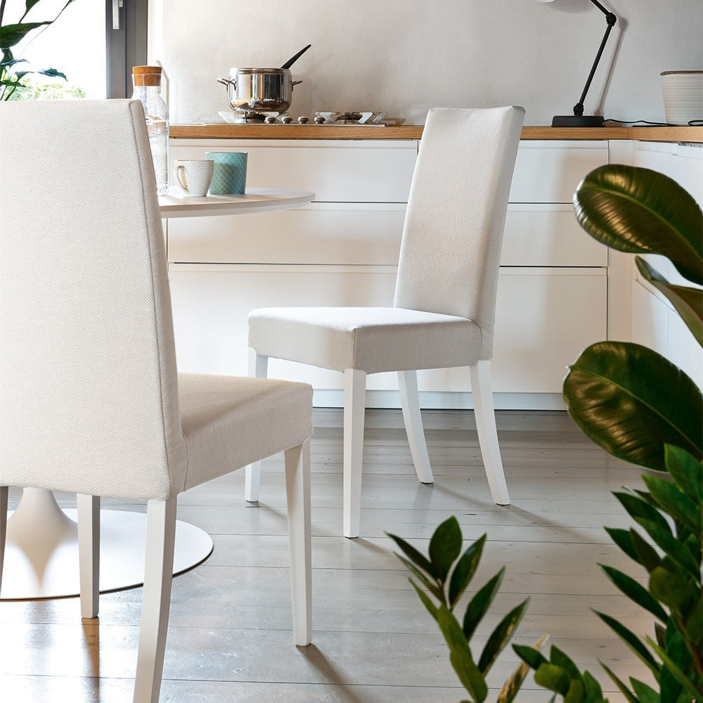 Copenhagen Wood Upholstered Dining Chair by Connubia in a styled interior