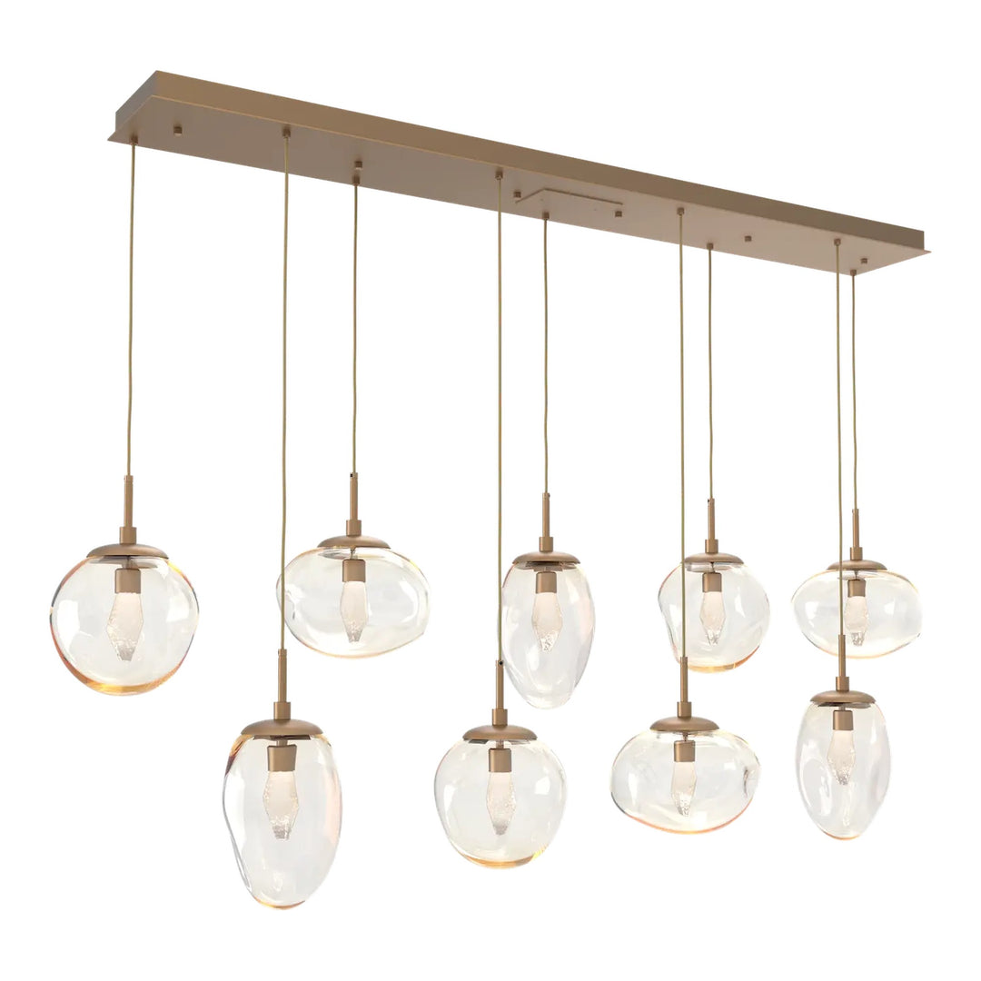 Cosmos Linear Pendant Chandelier by Hammerton Studio 9 Lights in Novel Brass with Amber glass (LED)