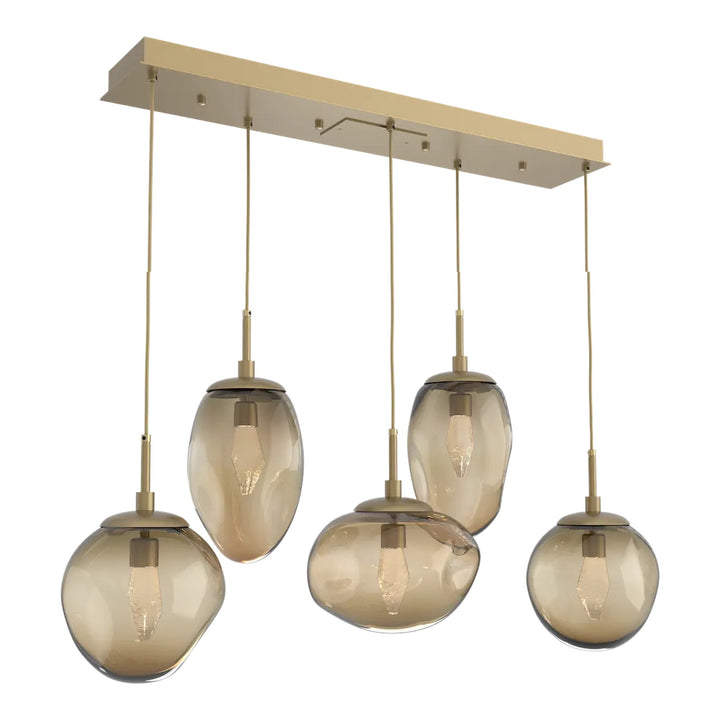 Cosmos Linear Pendant Chandelier by Hammerton Studio in Gilded Brass with Bronze glass