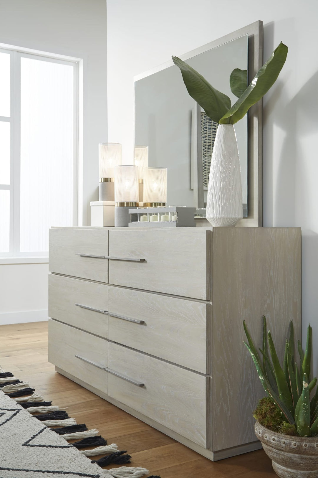 Destination Six Drawer Dresser in Cotton Grey — styled in a room