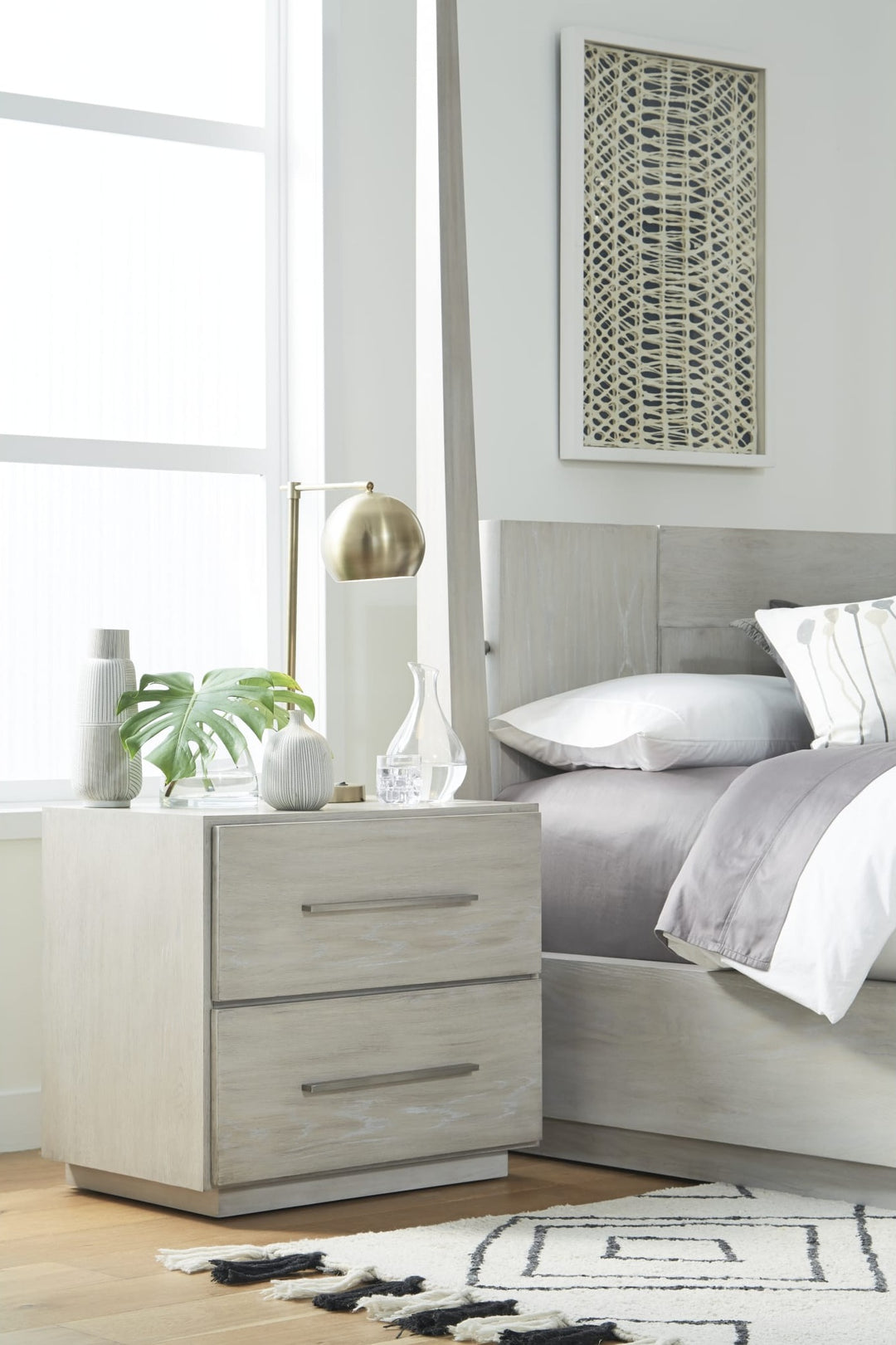 Destination Two Drawer Nightstand in Cotton Grey — in a bedroom setting