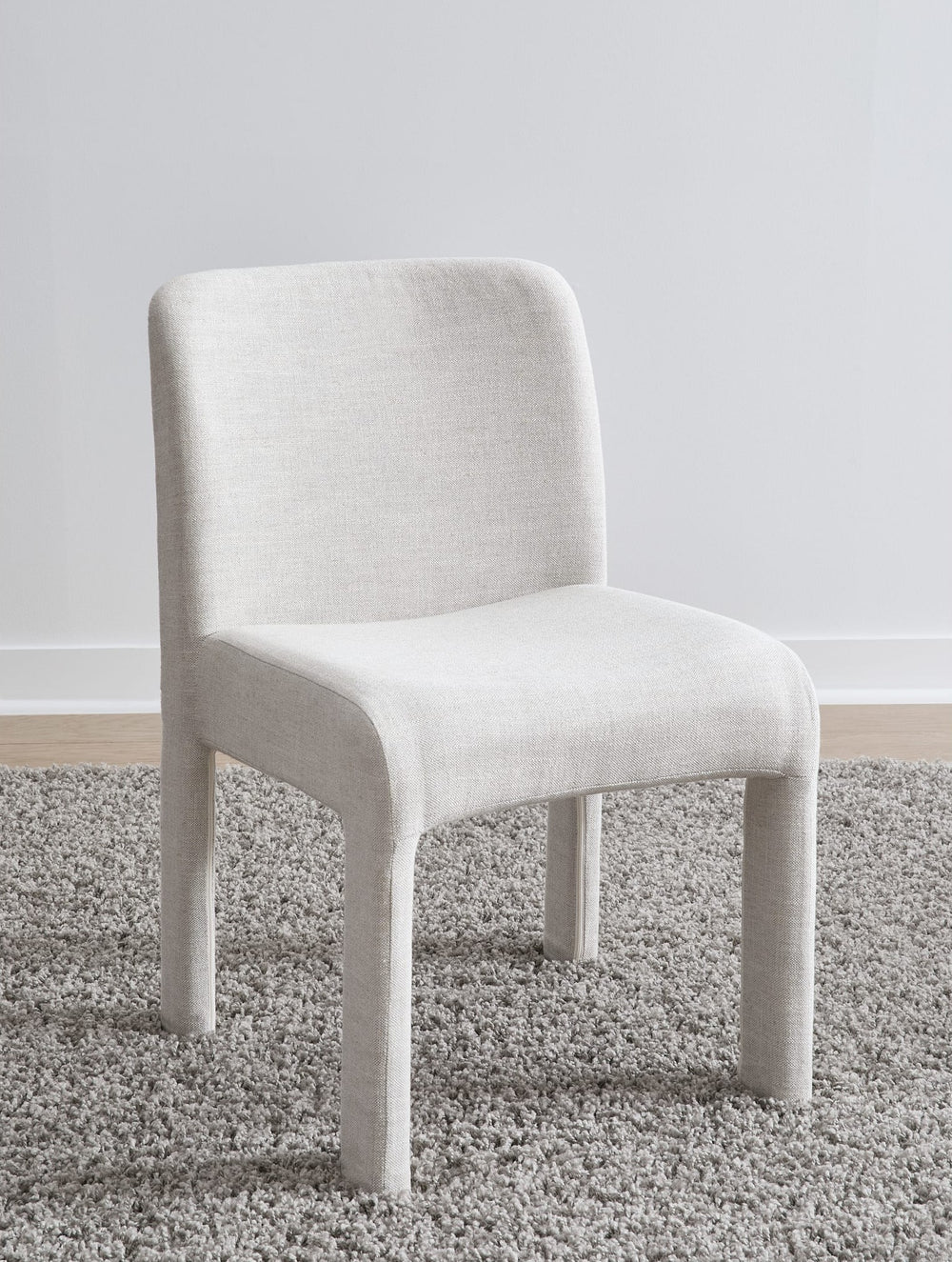 Devon Fully Upholstered Dining Chair in Turtle Dove Linen — lifestyle photo