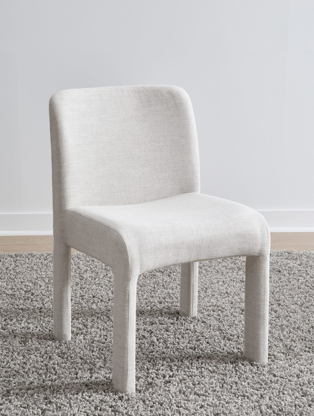 Devon Fully Upholstered Dining Chair in Turtle Dove Linen — lifestyle photo