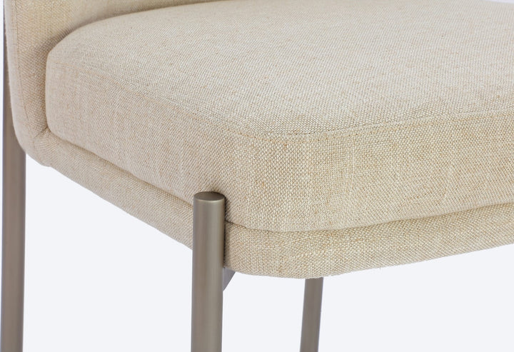 Dion Upholstered Dining Chair in Natural Light Linen and Brushed Nickel Metal — lifestyle photo