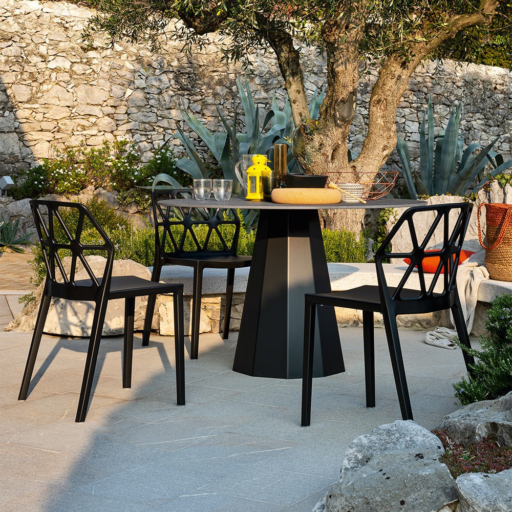 Dix Compact Round Dining Table by Connubia in a styled interior