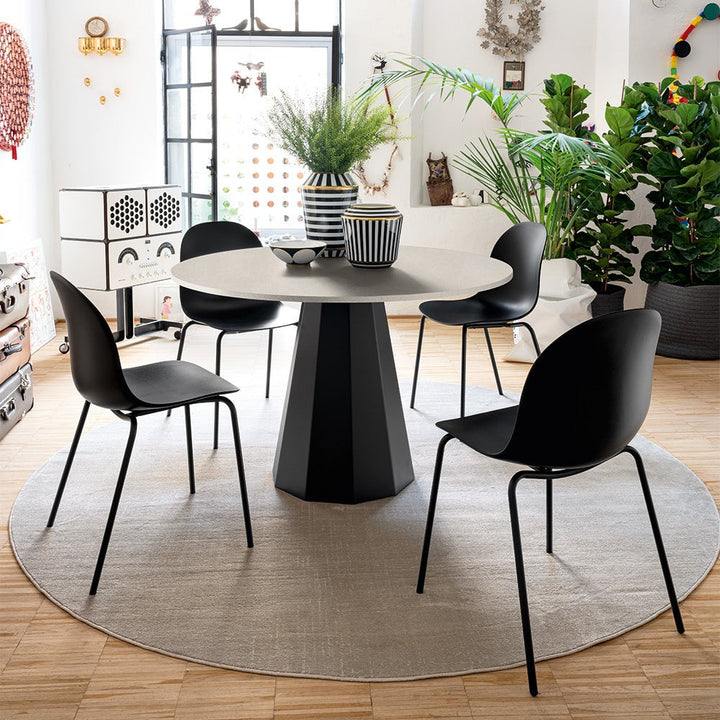 Dix Compact Round Dining Table by Connubia in a styled interior