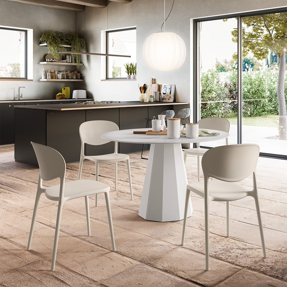 Dix Compact Round Dining Table by Connubia in a styled interior