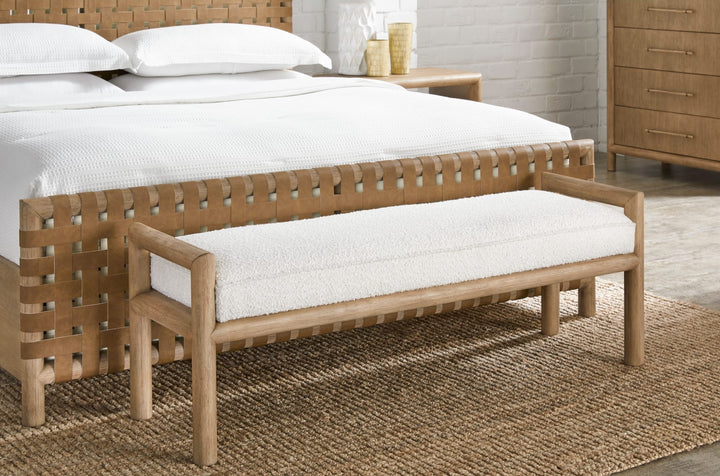 Dorsey Boucle Upholstered Wooden Bench in Granola and Ricotta at the foot of a Dorsey bed