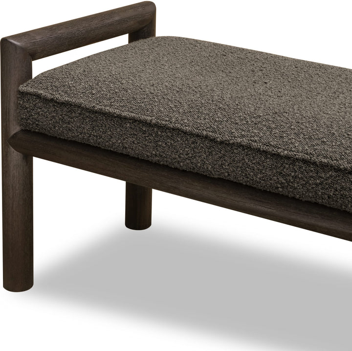 Dorsey Boucle Upholstered Wooden Bench — detail of the rounded Basalt Grey posts