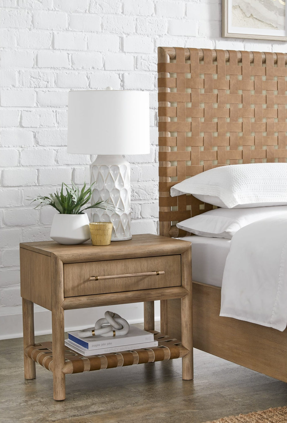 Dorsey One Drawer USB-Charging Nightstand in Granola beside a Dorsey woven bed