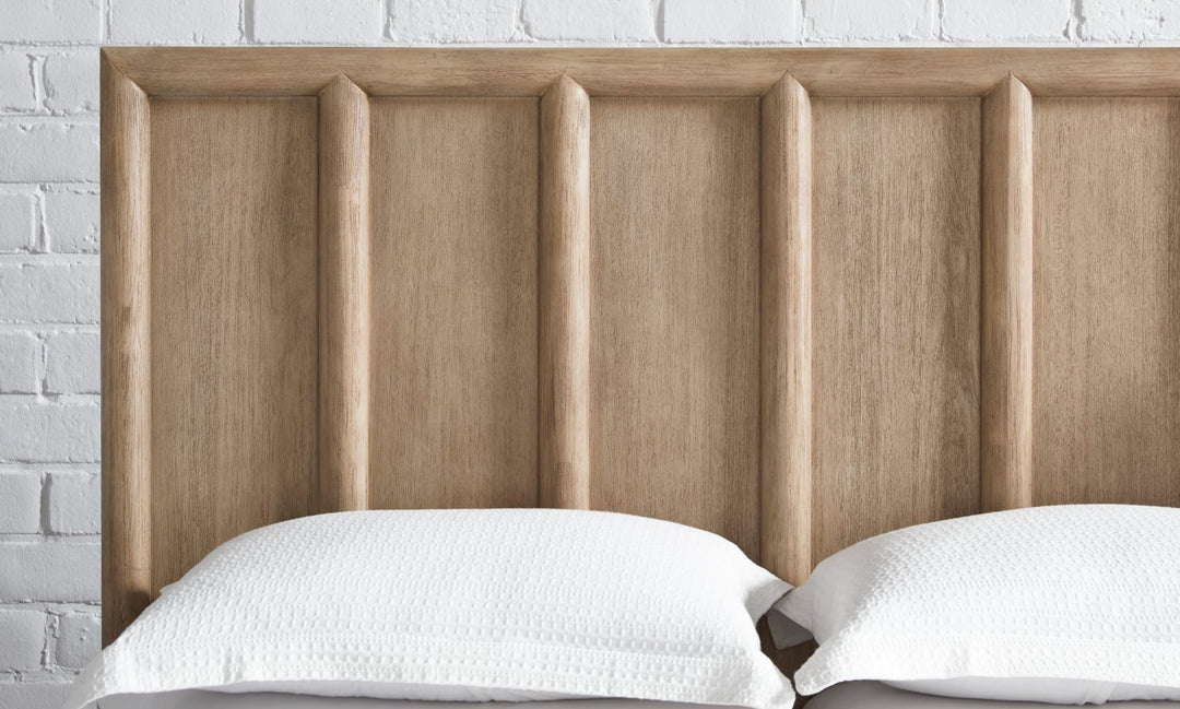 Dorsey Wooden Two Drawer Storage Bed — close-up of the grooved headboard in Granola
