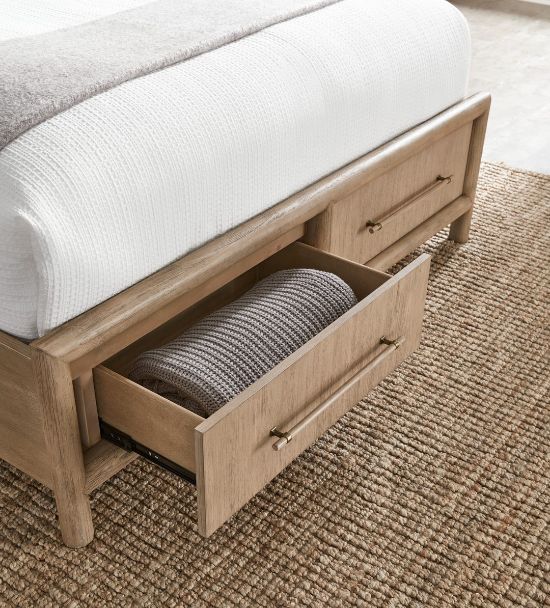 Dorsey Wooden Two Drawer Storage Bed — open underbed storage drawer in a bedroom