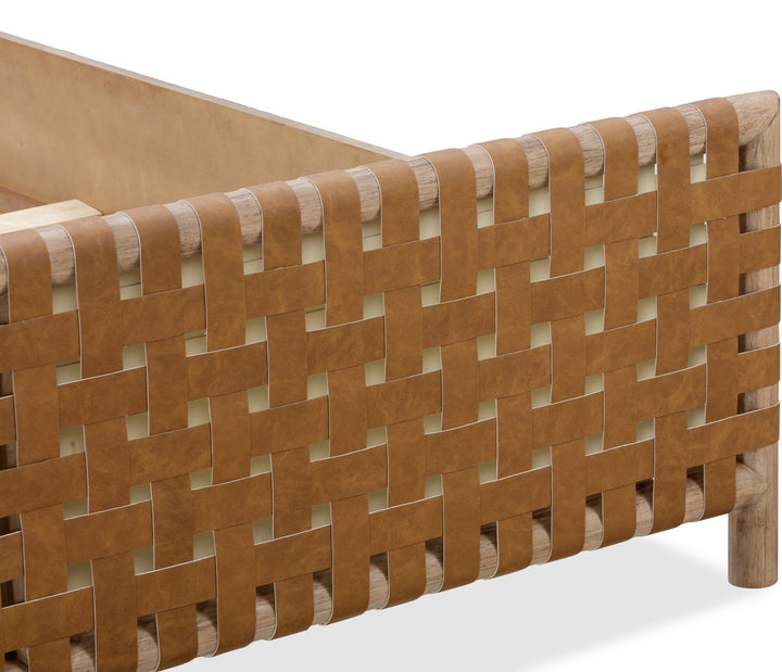 Dorsey Woven Panel Bed — detail of the rounded frame and woven panel