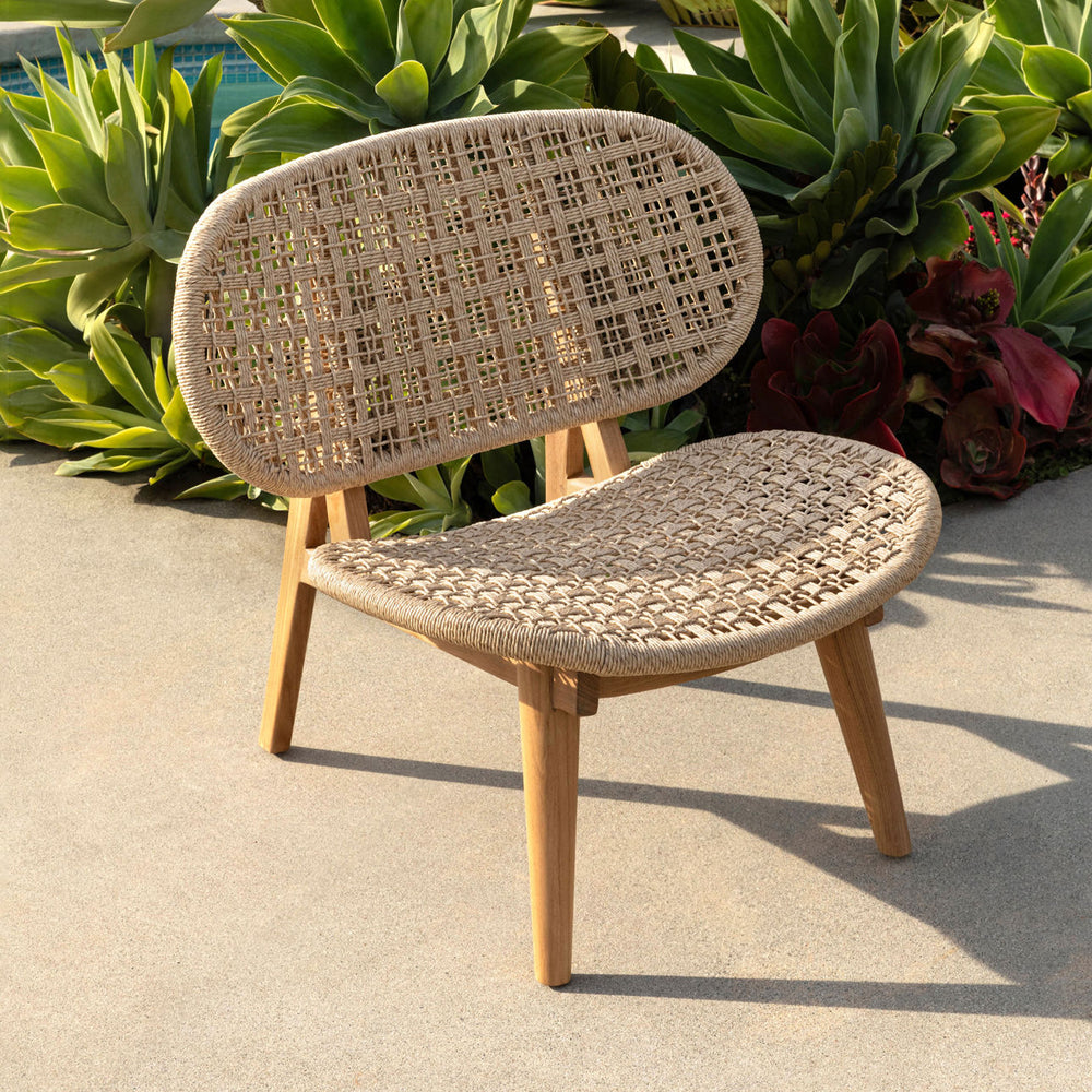 Hermelle Woven Teak Outdoor Lounge Chair, lifestyle view
