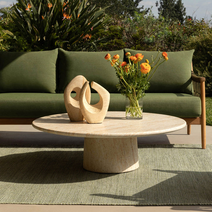 Treva Faux Travertine Outdoor Coffee Table, lifestyle view