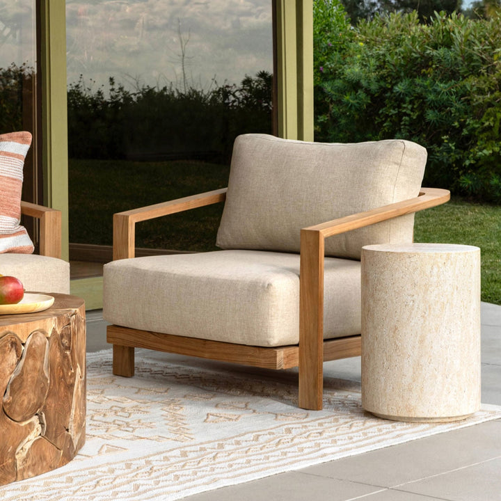Belen Faux Travertine Outdoor Side Table, manufacturer lifestyle setting