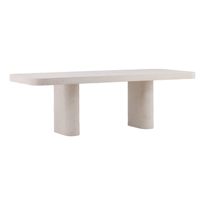 Amara Concrete Outdoor Dining Table, Ivory, three-quarter studio view