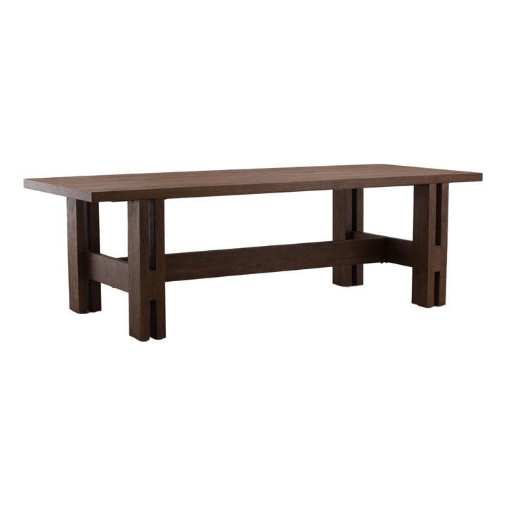 Somerset Dark Oak Dining Table, three-quarter studio view