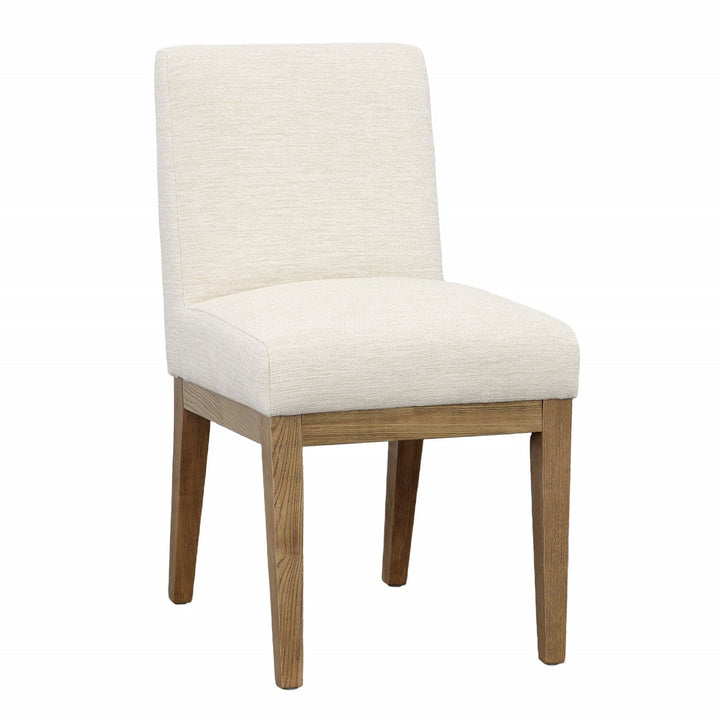 Weiland Upholstered Dining Chair, Cream and Natural, three-quarter studio view