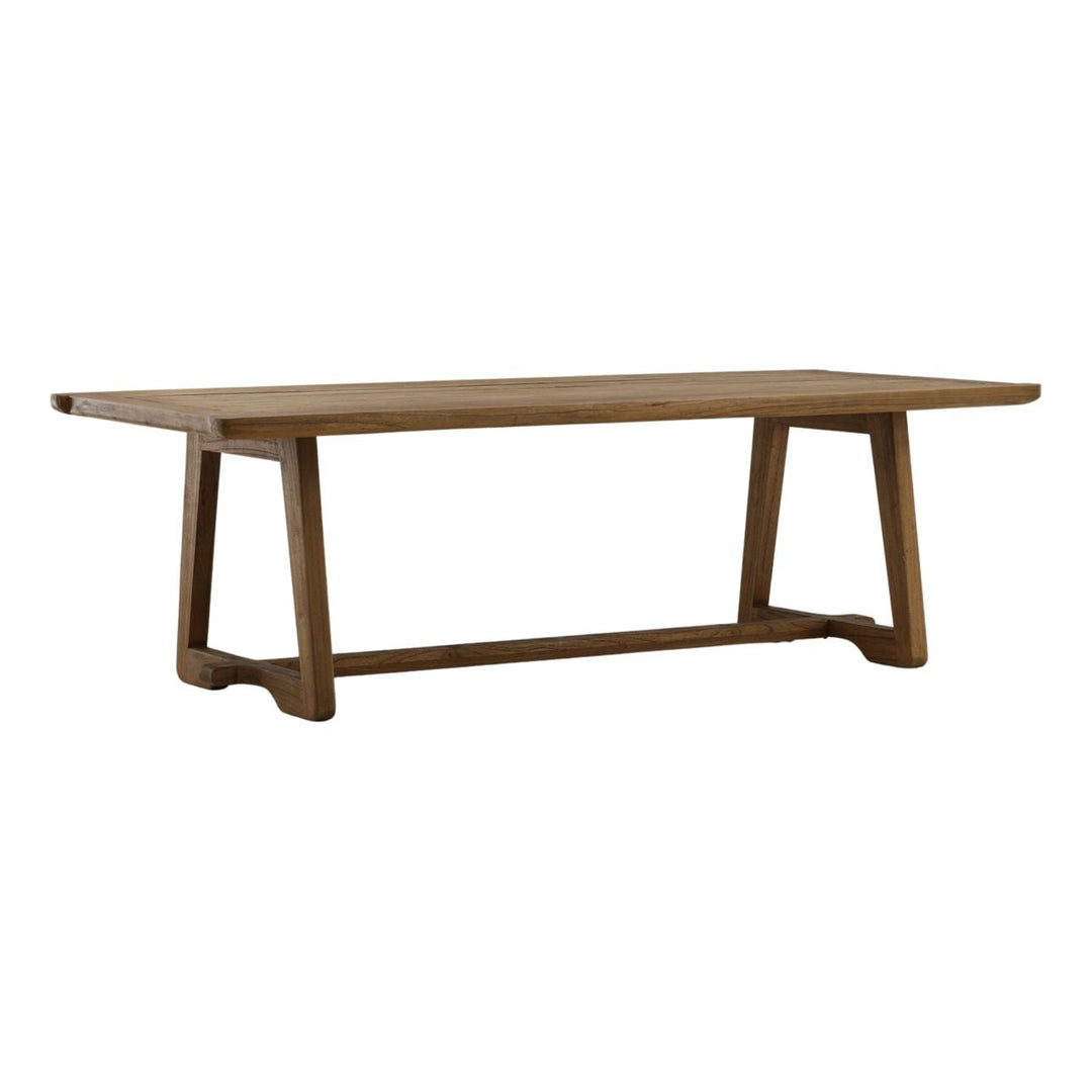 Kara Mindi Wood Dining Table, three-quarter studio view