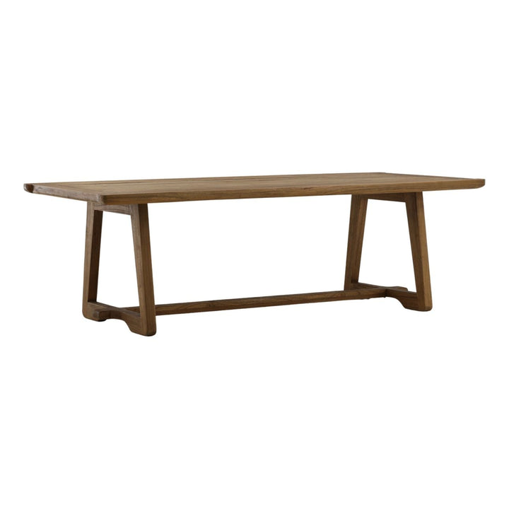 Kara Mindi Wood Dining Table, three-quarter studio view
