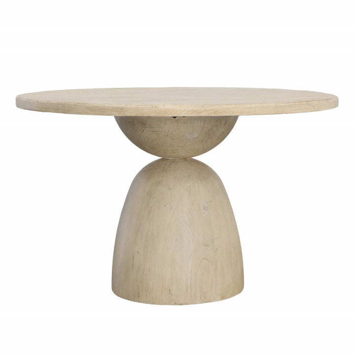Caspian Reclaimed Pine Round Dining Table, Light Warm Wash, three-quarter studio view