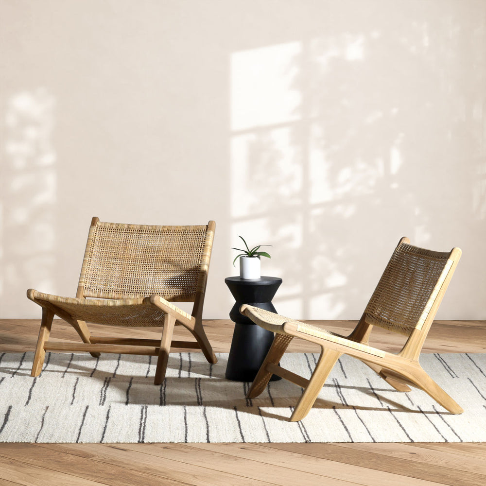 Emren Natural Teak Rattan Lounge Chair, lifestyle view