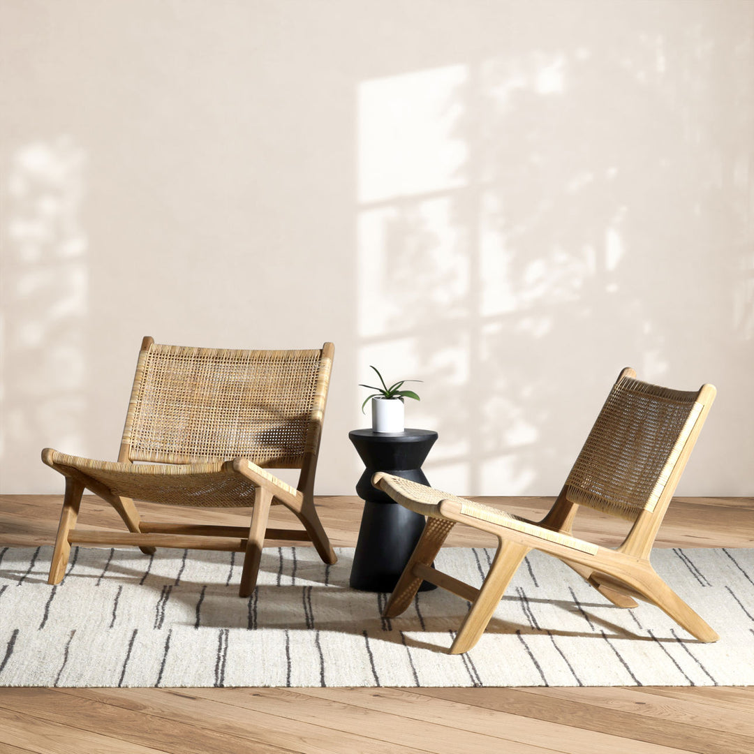 Emren Natural Teak Rattan Lounge Chair, lifestyle view