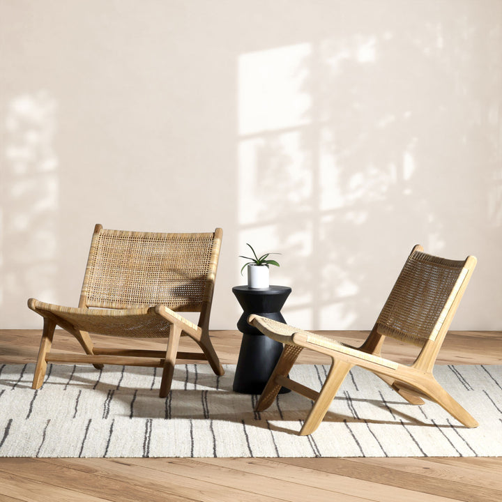 Emren Natural Teak Rattan Lounge Chair, lifestyle view