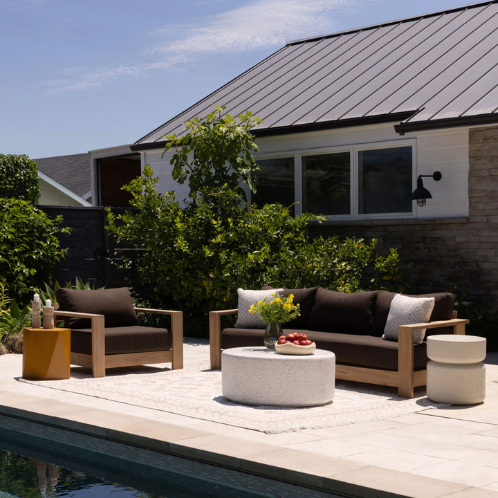Nayren Chocolate Teak Outdoor Sofa, lifestyle view