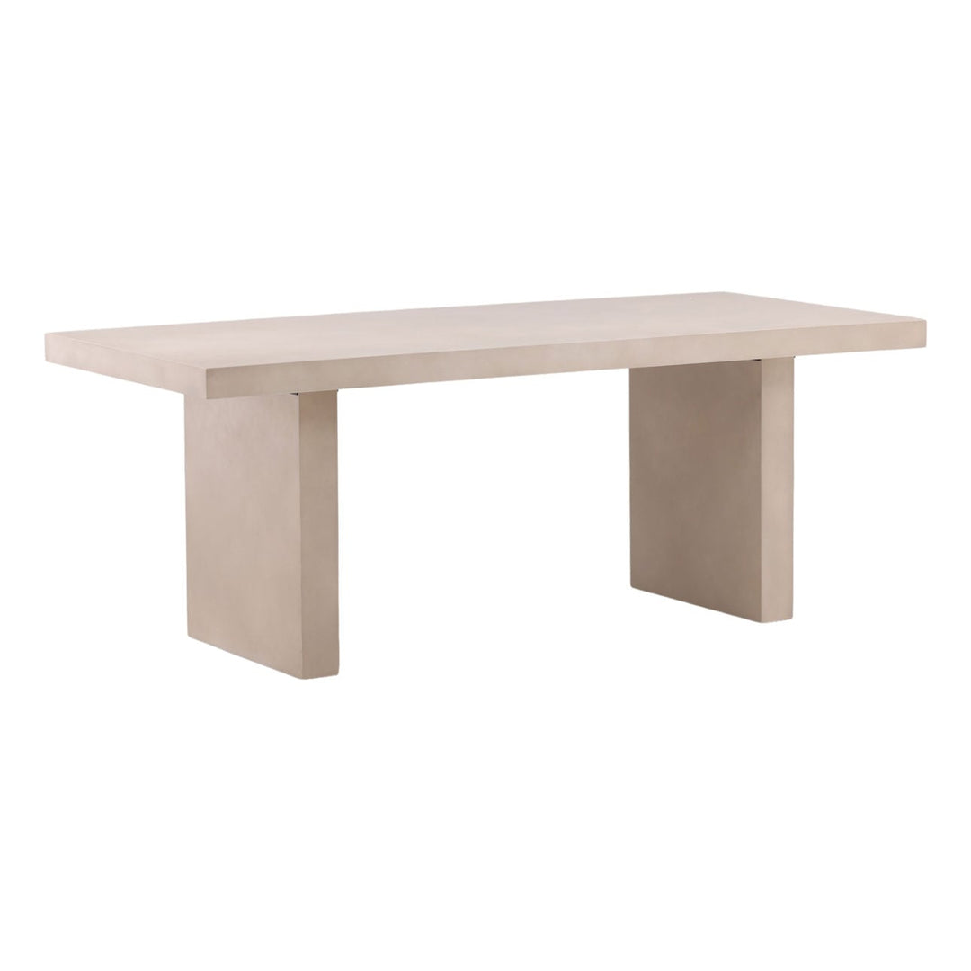 Santos Sand Concrete Outdoor Dining Table, three-quarter studio view