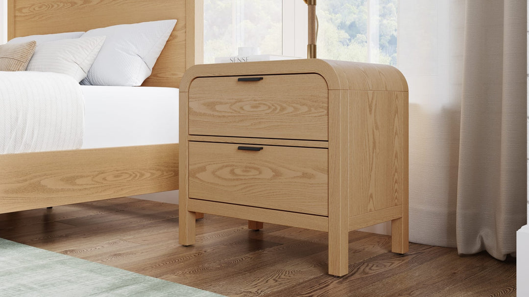 Drake Two Drawer USB-Charging Nightstand in Timber — in a bedroom setting