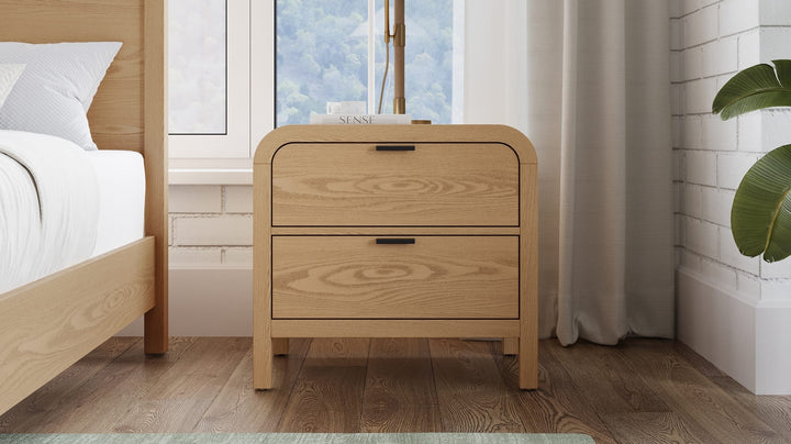 Drake Two Drawer USB-Charging Nightstand in Timber — in a bedroom setting