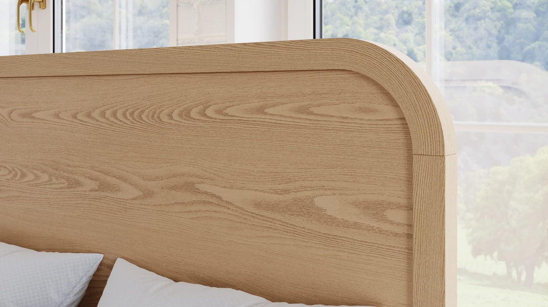 Drake Wood Platform Bed in Timber — close-up of the rounded footboard