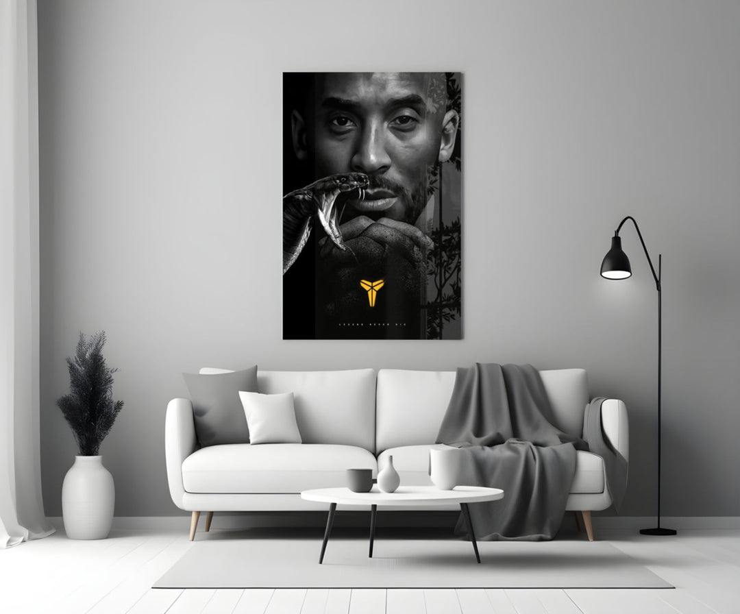Kobe Bryant glass wall art styled above a console in a media room