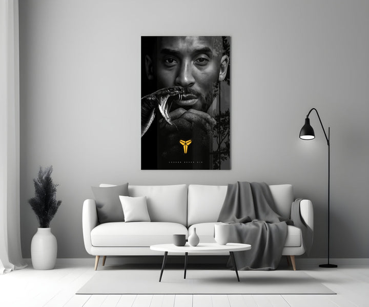 Kobe Bryant glass wall art styled above a console in a media room