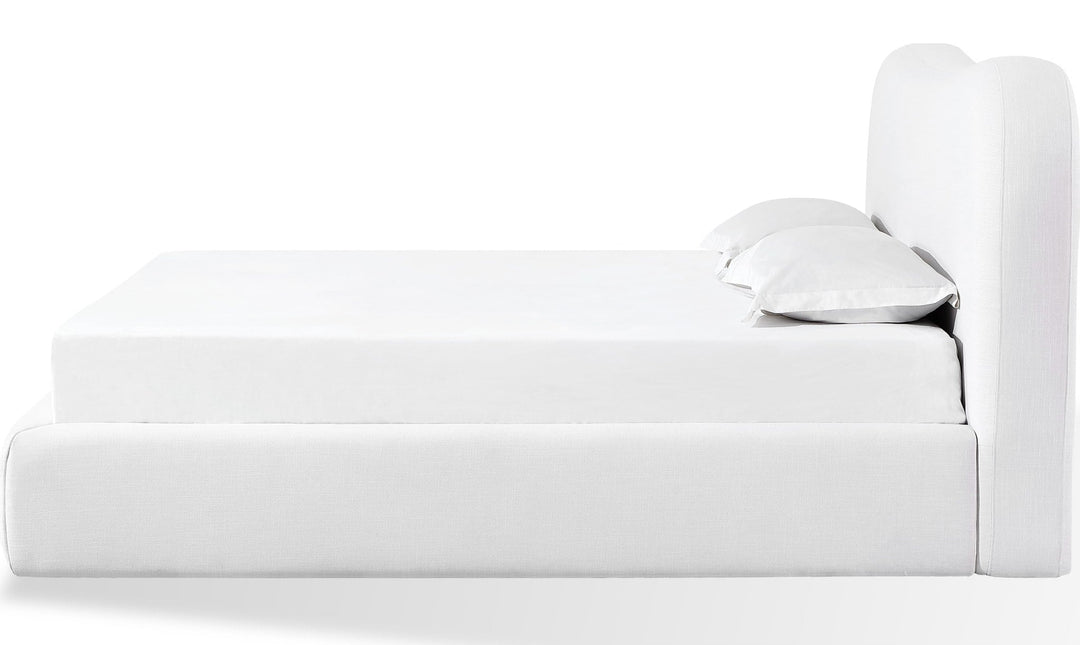 Elena Upholstered Bed in Vanilla Linen — white background, side profile