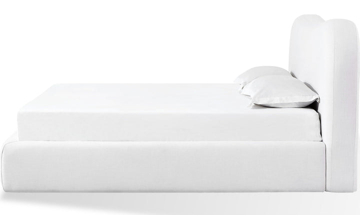 Elena Upholstered Bed in Vanilla Linen — white background, side profile