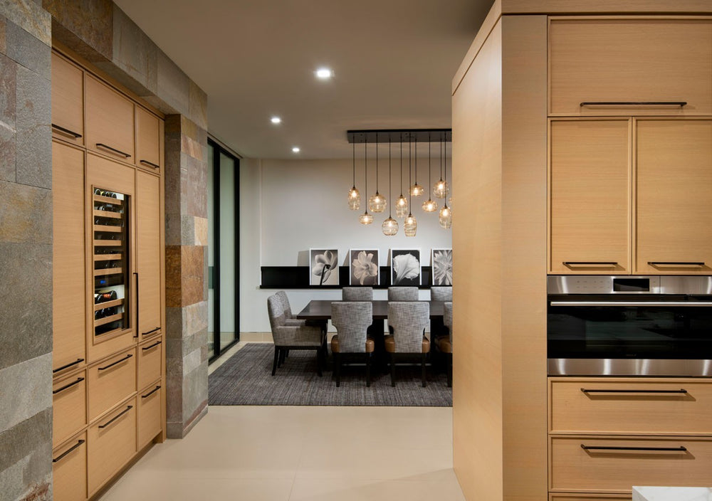 Ellisse Linear Pendant Chandelier by Hammerton Studio in a styled interior