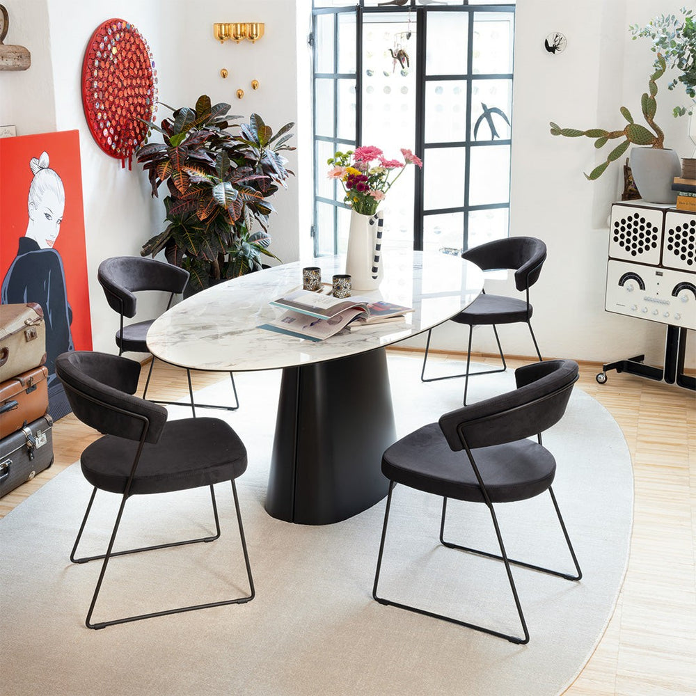 Ellisse Oval Dining Table by Connubia in a styled interior