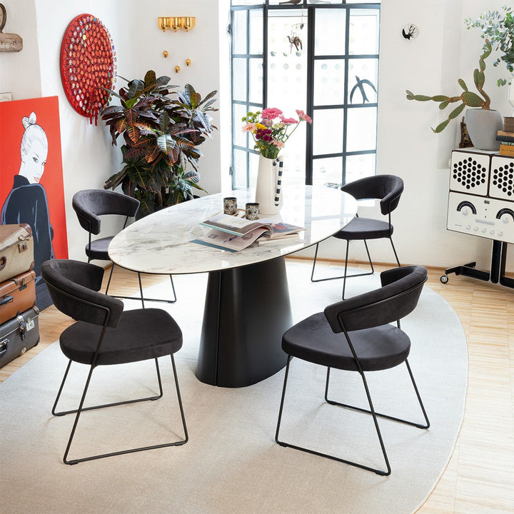 Ellisse Oval Dining Table by Connubia in a styled interior