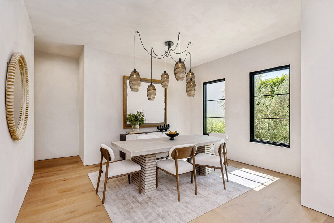 Ellisse Swag Chandelier by Hammerton Studio in a styled interior