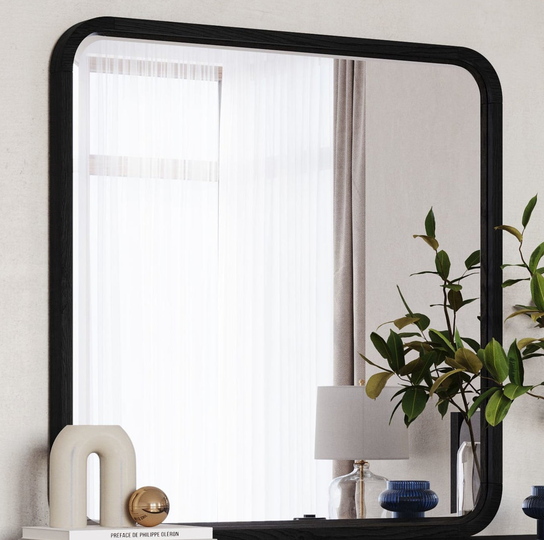 Elora Dresser Mirror in Jet — styled in a room