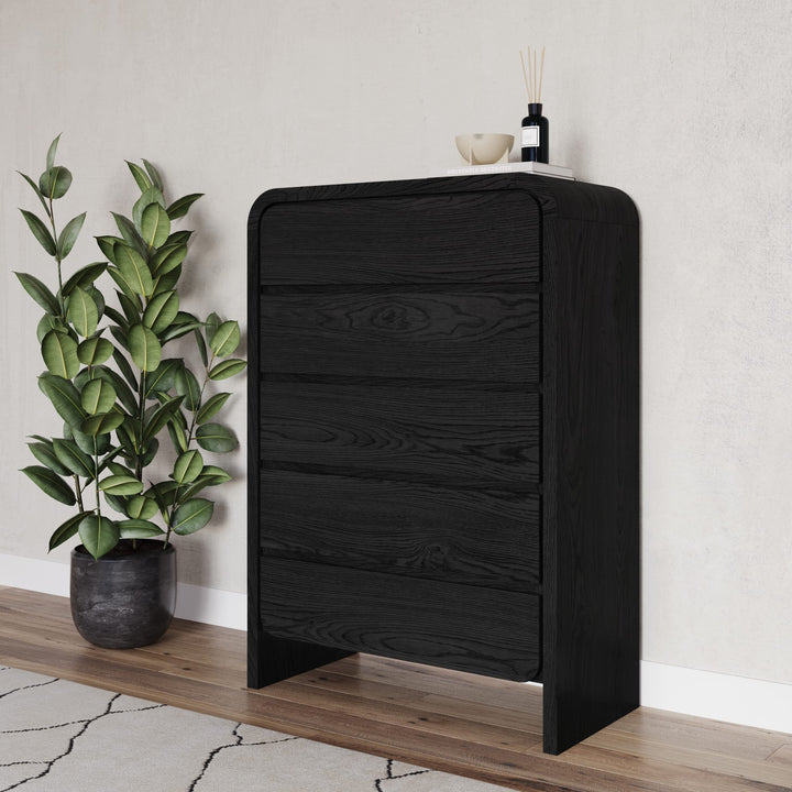 Elora Five Drawer Chest in Jet — styled in a room