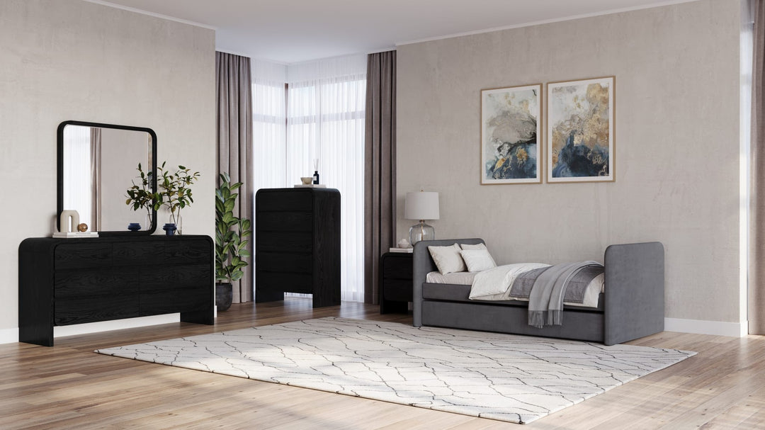 Elora Five Drawer Chest in Jet — in a bedroom setting