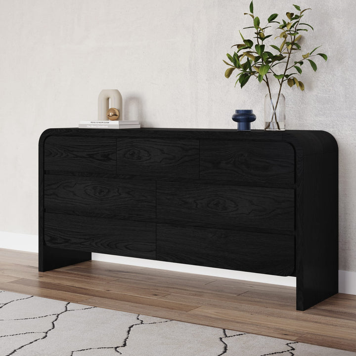 Elora Seven Drawer Dresser in Jet — styled in a room