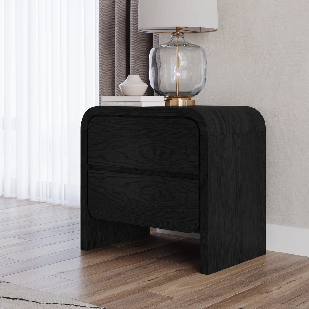 Elora Two Drawer Nightstand in Jet — in a bedroom setting