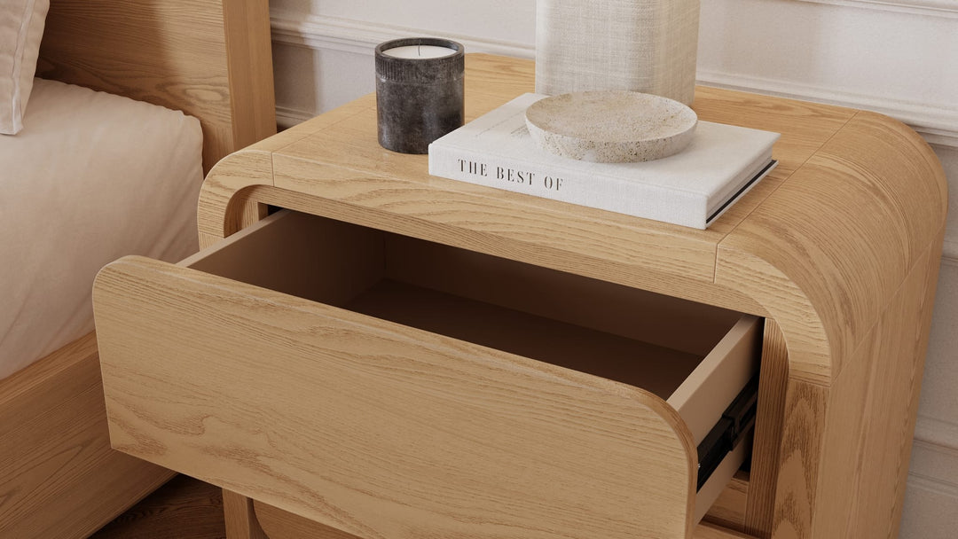 Elora Two Drawer Nightstand in Timber — in a bedroom setting