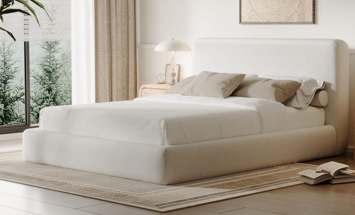 Elora Upholstered Platform Bed in Whitewashed Chenille styled in a bedroom