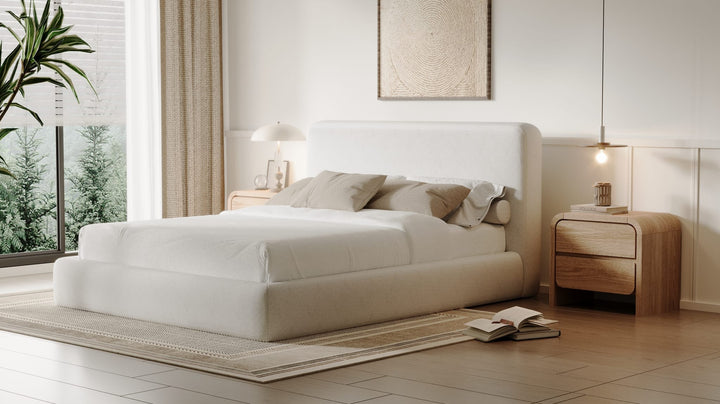 Elora Upholstered Platform Bed in Whitewashed Chenille styled in a bedroom